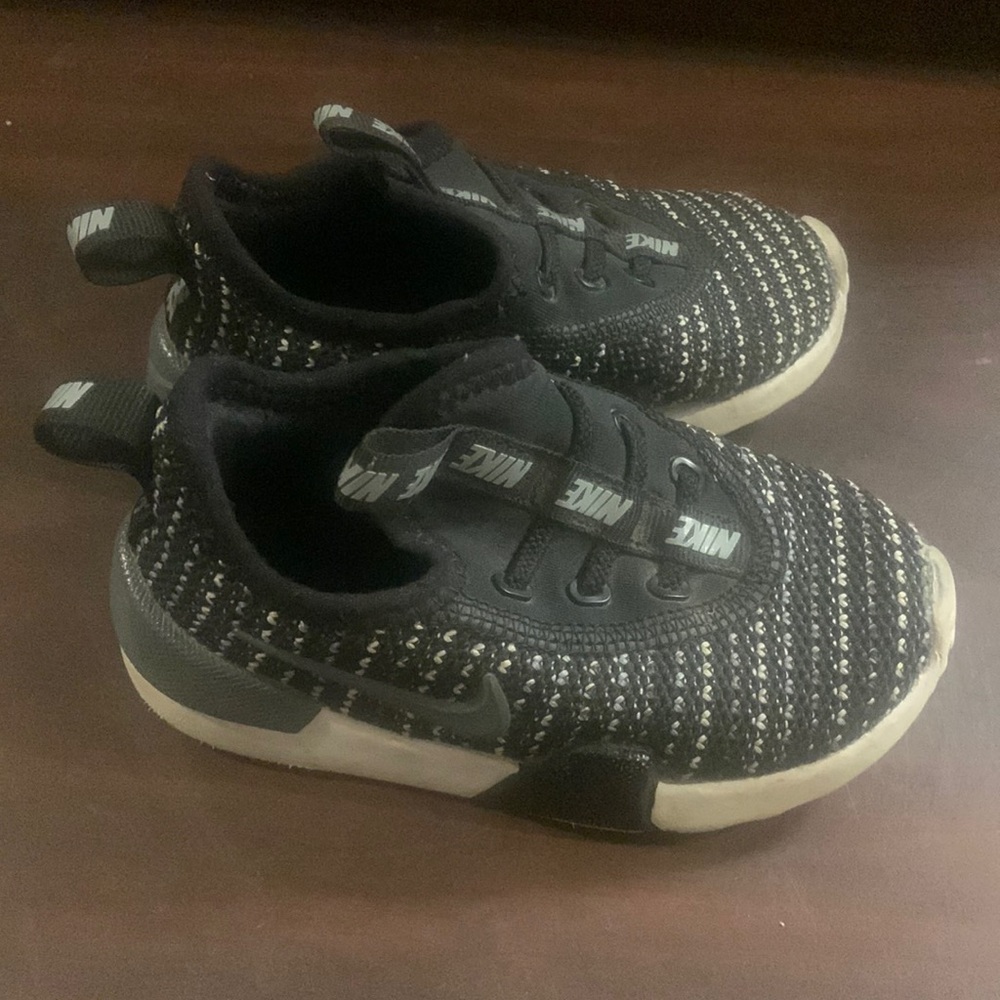 Nike tennis shoes. Baby size 7